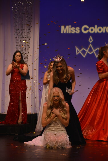 Former Miss Colorado Savannah Cavanaugh crowning Madison Marsh as the new Miss Colorado.